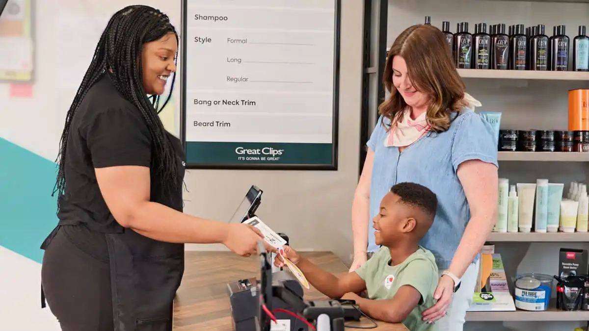 Customer donating to CMN at a salon